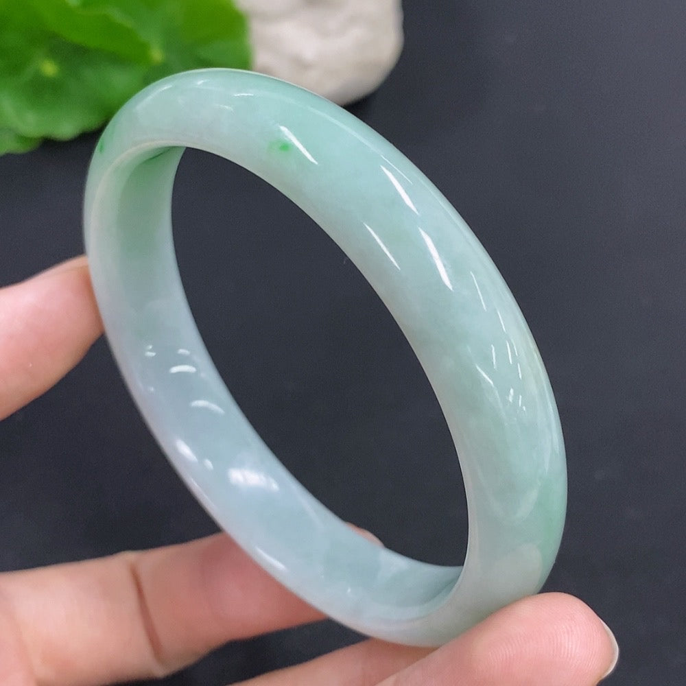 HKHQ jadeite round bangle, 46.8g, size 59.5, showcasing smooth, polished jadeite with a glossy finish.
