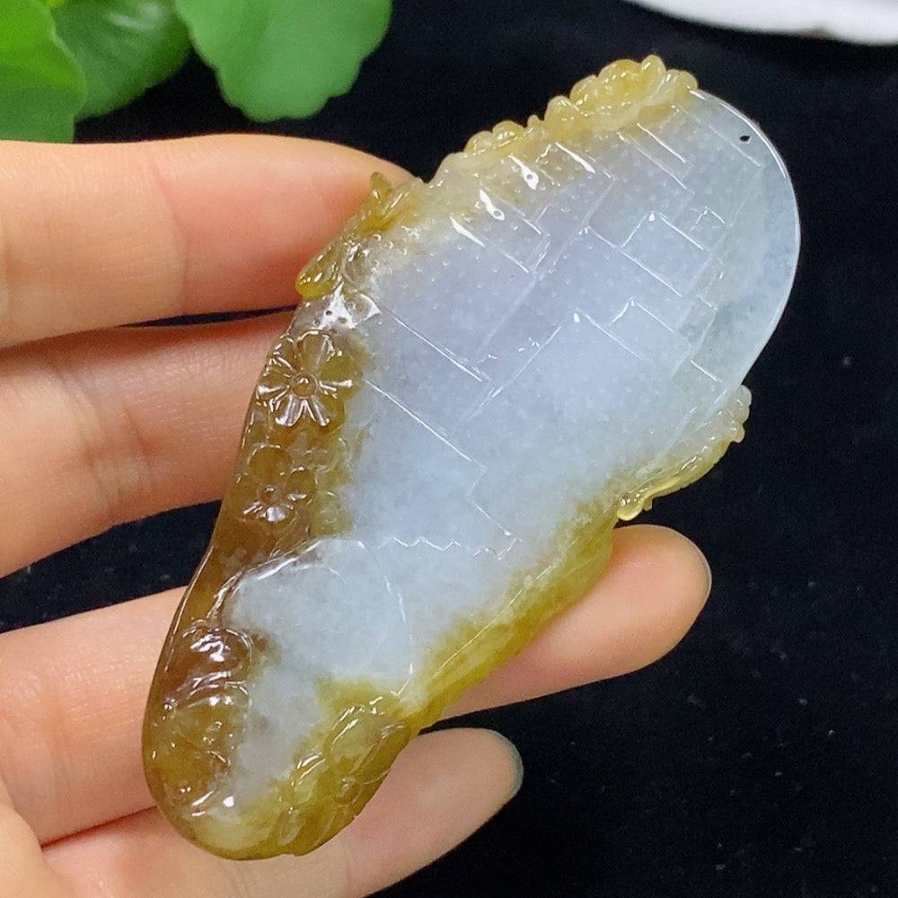 Huiliu certified jadeite pendant showcasing smooth, polished green jade with intricate carving details.