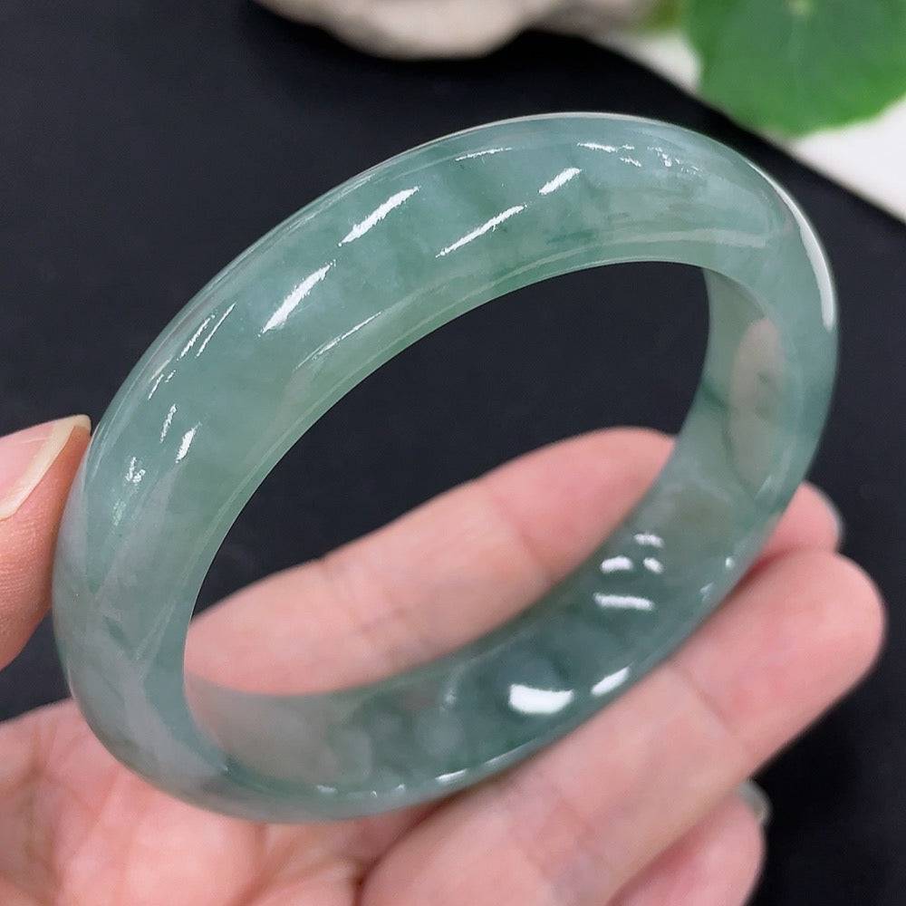 Huiliu Jadeite round bracelet featuring smooth, polished jade beads on a delicate string, certified by Huiliu HQ.