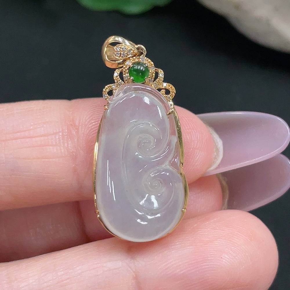 Jadeite Ruyi pendant in 18K gold with diamond accents, showcasing intricate jade carving and elegant design.
