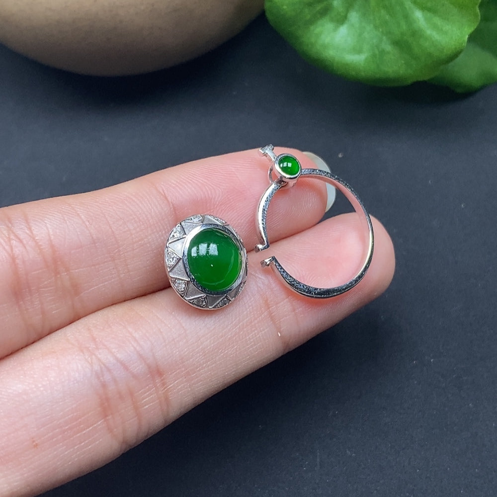 Elegant jadeite jewelry set with two cabochons and diamonds in 18K gold, featuring intricate craftsmanship and luxurious design.