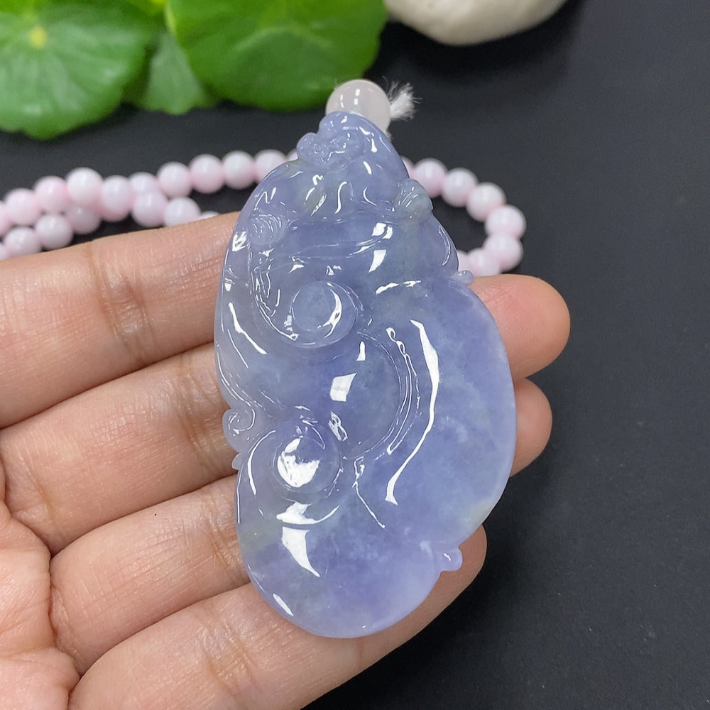 Huiliu Jadeite Ruyi pendant with chain, traditional Chinese jewelry, featuring smooth green jade and detailed craftsmanship.