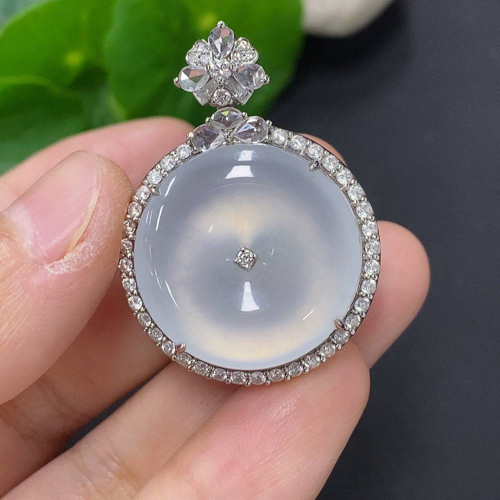 Huiliu Jadeite pendant accented with a large diamond, showcasing a polished jade stone with intricate craftsmanship.