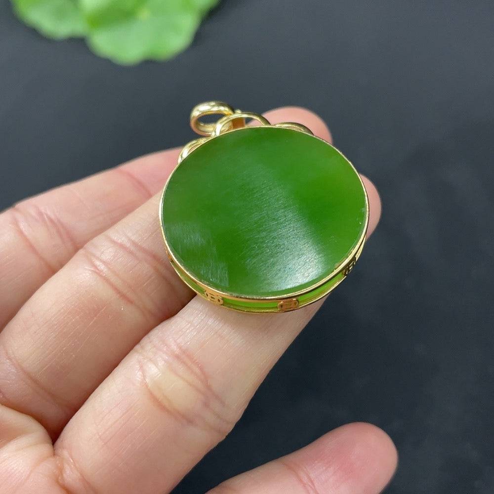 Hetian Jade Jasper inlaid pendant with 18k gold setting, plain design, weighs approximately 8.1g, showcasing elegant craftsmanship.
