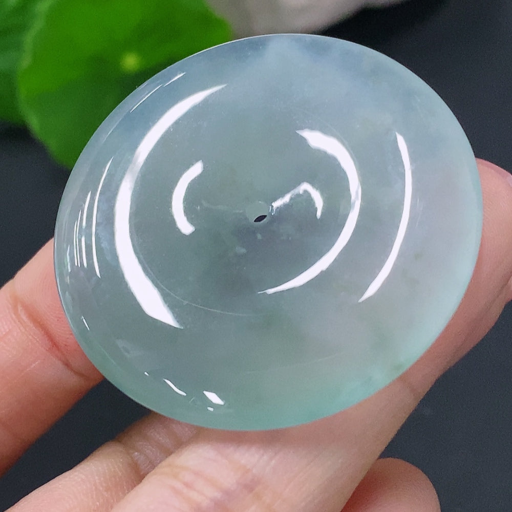 Jadeite pendant with peace knot design, crafted from green jade, weighing approximately 20.19g, by HUILIU HQ.