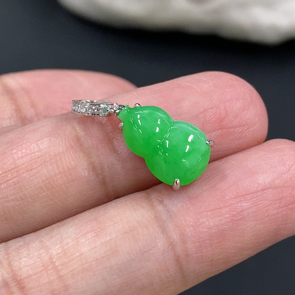 Jadeite gourd pendant with 18K gold and diamond accents, featuring intricate inlay work, from HKHQ.