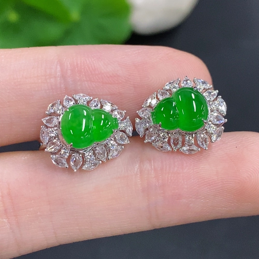 Jadeite gourd earrings with 18K gold and diamond accents, elegant jewelry featuring intricate design and sparkling gemstones.