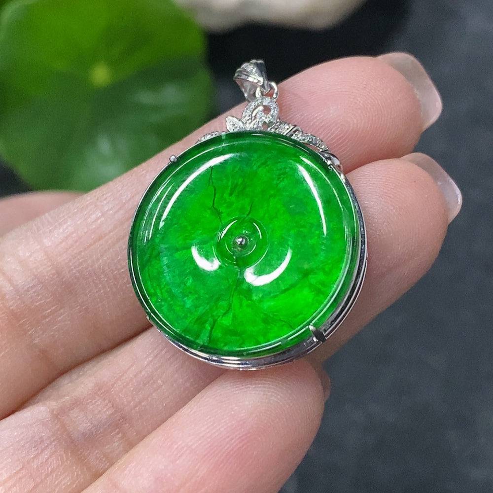 HUILIU HQ jadeite pendant with inlaid safety buckle, diamonds, featuring visible cracks and damage, crafted from quality jade.