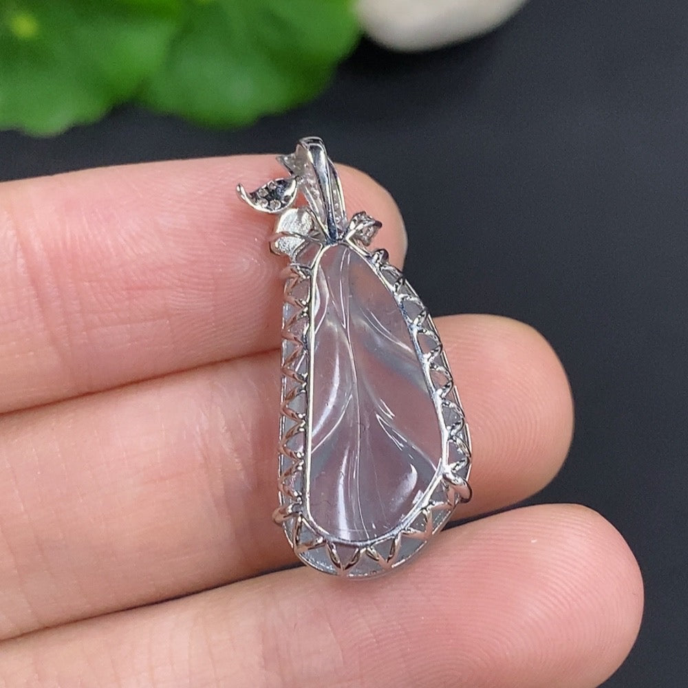 Huiliu Jadeite leaf pendant with diamond accents, crafted from green jade, elegant jewelry piece with detailed leaf design and sparkling stones