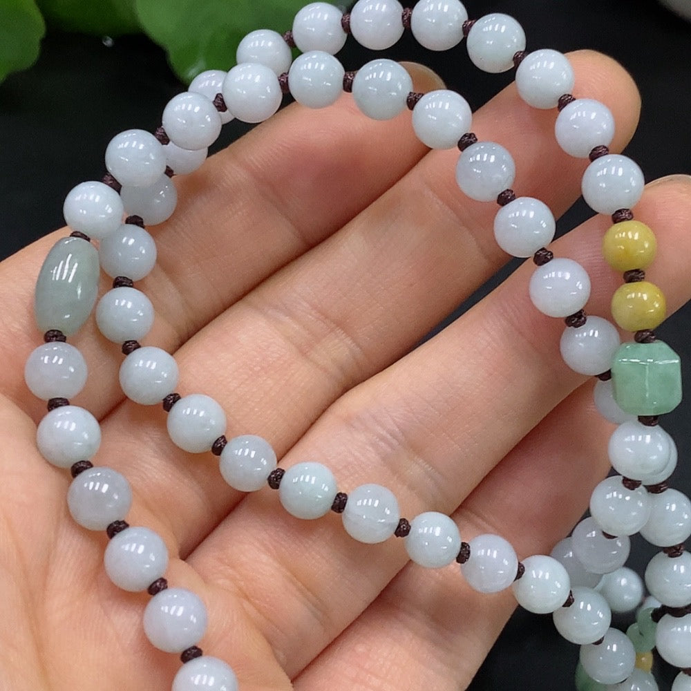Jadeite Guanyin Pendant with a Total Weight of Approximately 61.89g (Including Chain) and Yellow Beads of Undetermined Color Origin