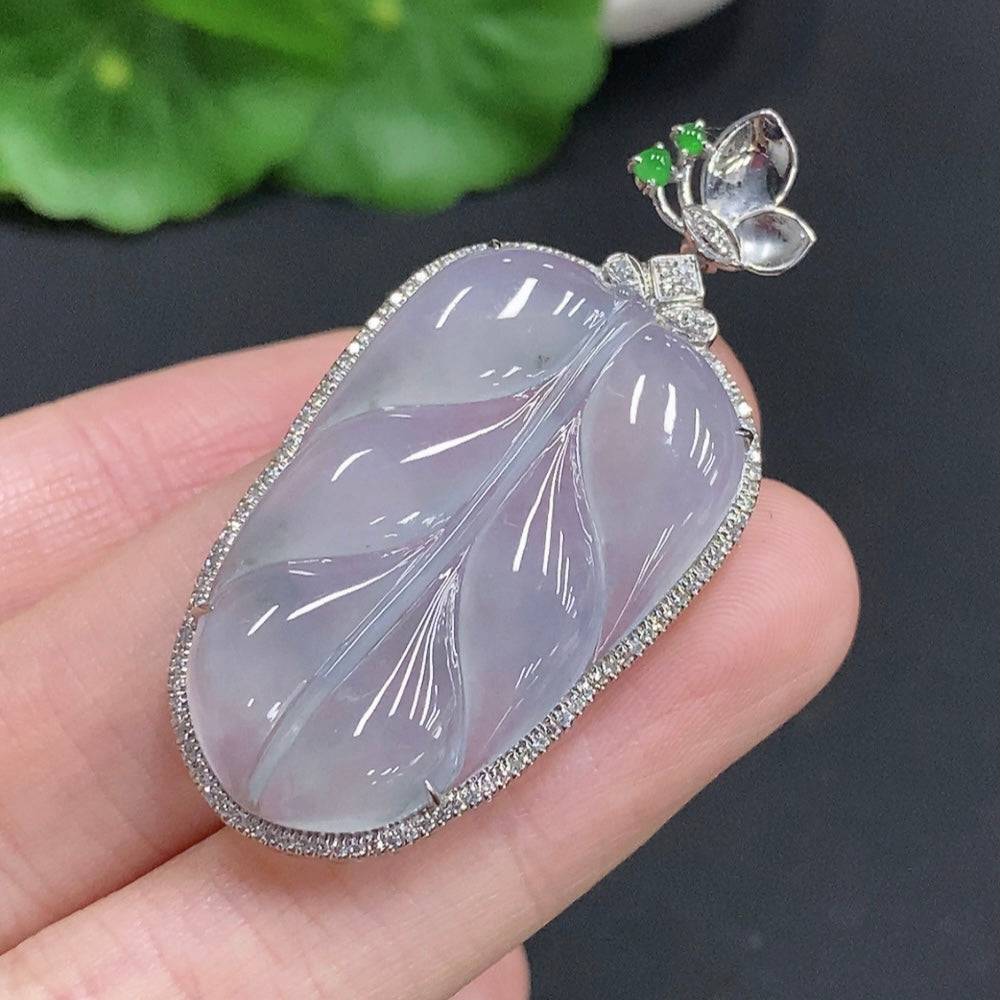 Huiliu Jadeite leaf inlay pendant with diamond accents, crafted from green jade, showcasing intricate inlay work and elegant design.