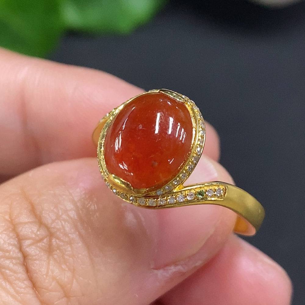 Huiliu Jadeite cabochon ring with colorless diamond accents, elegant jewelry piece featuring polished jade gemstone and sparkling diamonds