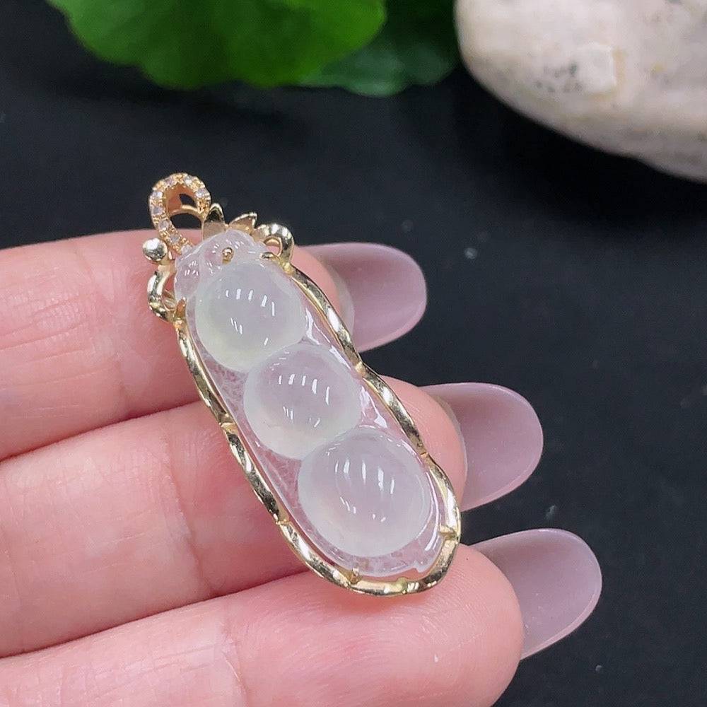 Huiliu Jadeite Fu Dou pendant with diamond accents, showcasing intricate green jade carving and elegant design.