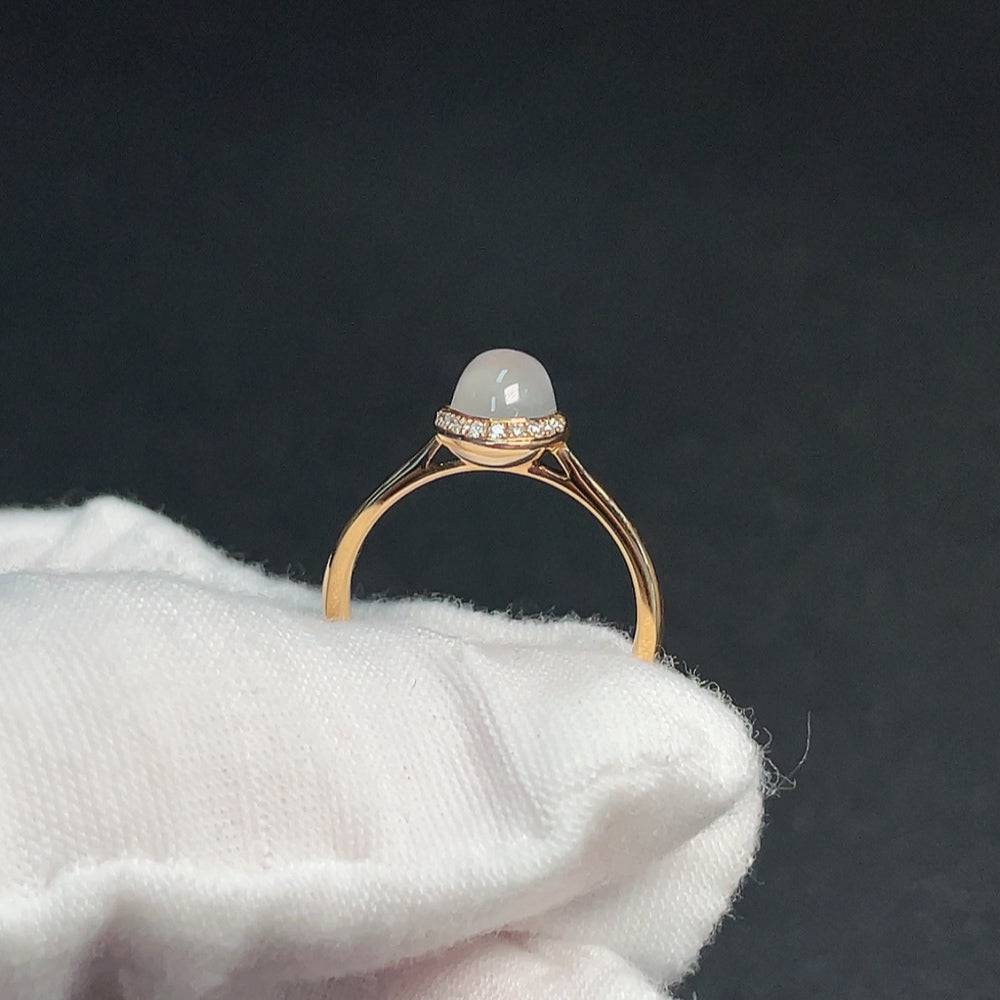 Huiliu certified moonstone gemstone ring featuring visible organic matter, showcasing natural textures and unique gemstone details.
