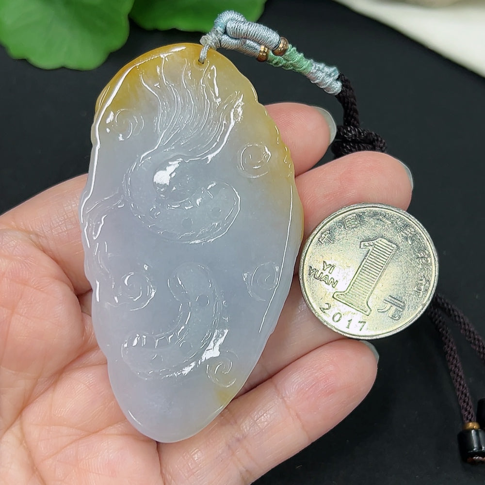 Jadeite dragon pendant with rope, weighing approximately 53.8g, featuring a detailed green jade dragon design.