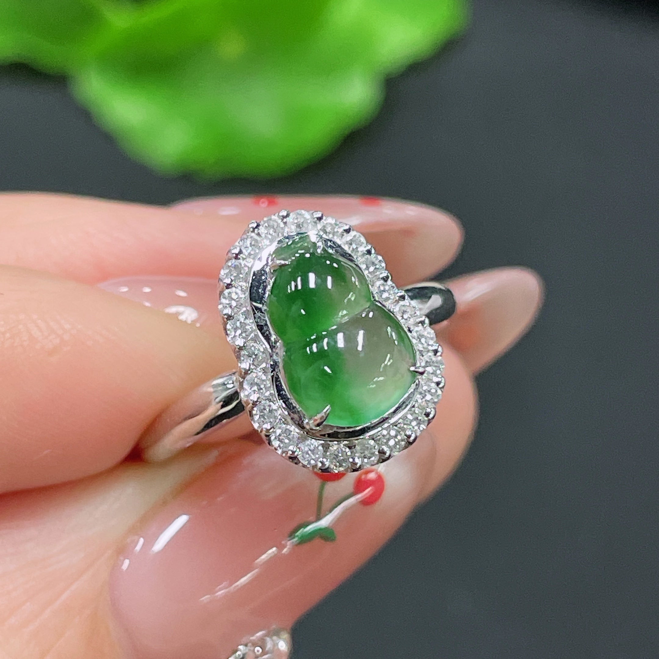Huiliu Jadeite ring setting with diamond accent, crafted in green jade, showcasing elegant jewelry design and craftsmanship.