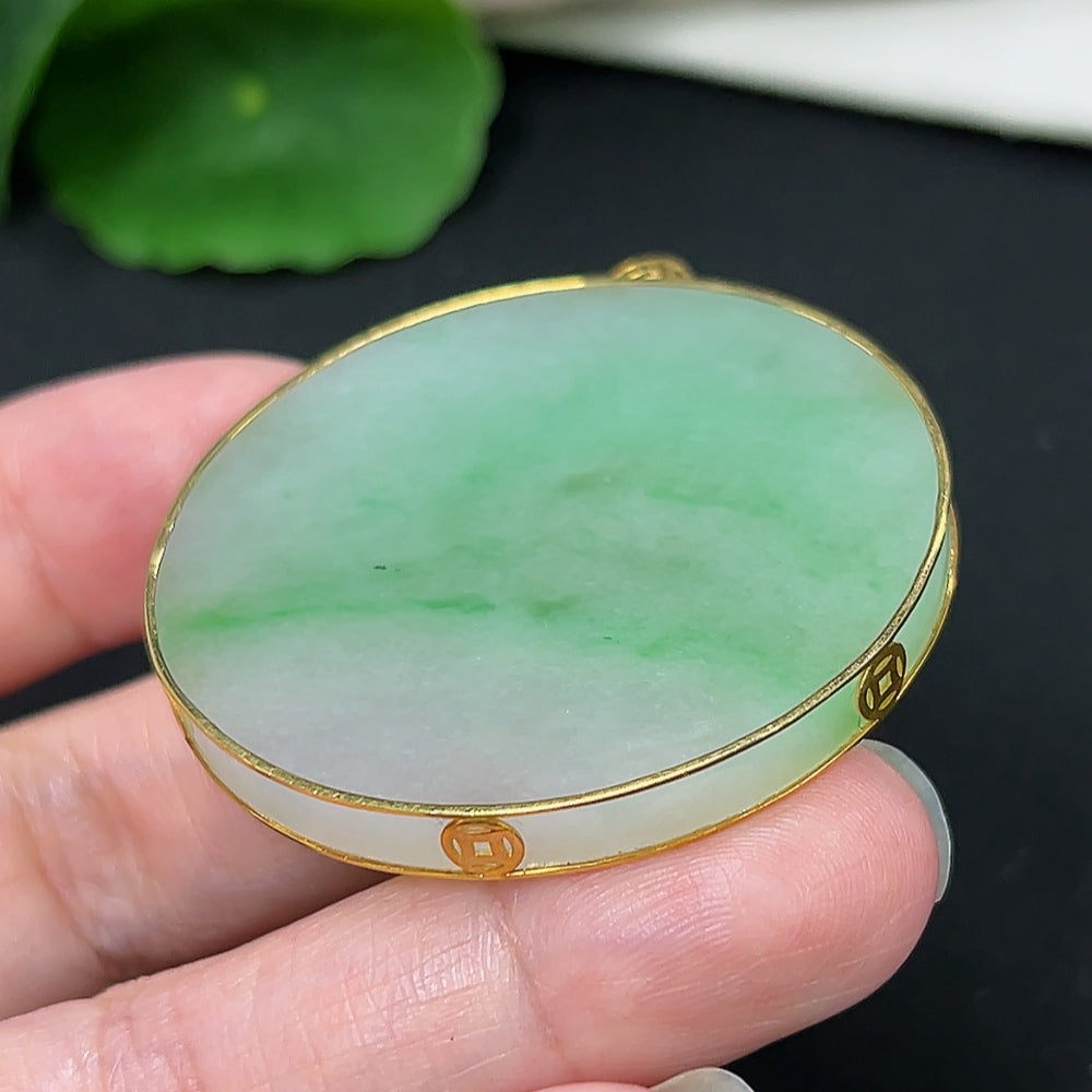 Jadeite plain pendant necklace with 18K gold setting, showcasing a smooth, polished jade pendant on a delicate chain.