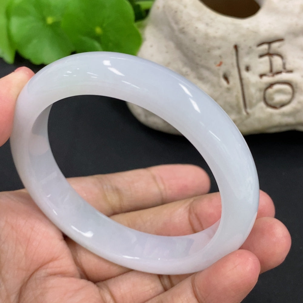 Jadeite round bracelet with a total weight of 53.57g and size 55.7, featuring smooth, polished jadeite beads from HKHQ.