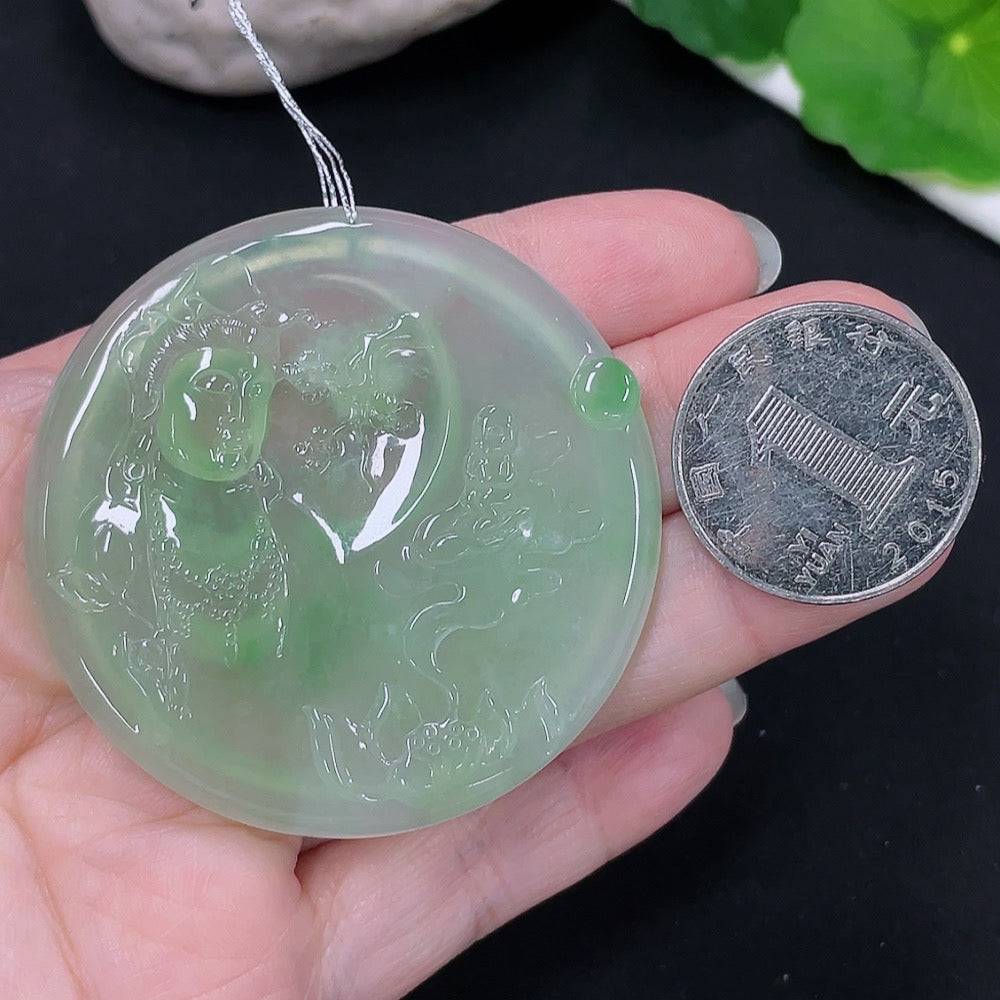 Huiliu Jadeite Guanyin pendant featuring detailed carved figure, crafted from green jade, with a smooth polished finish.