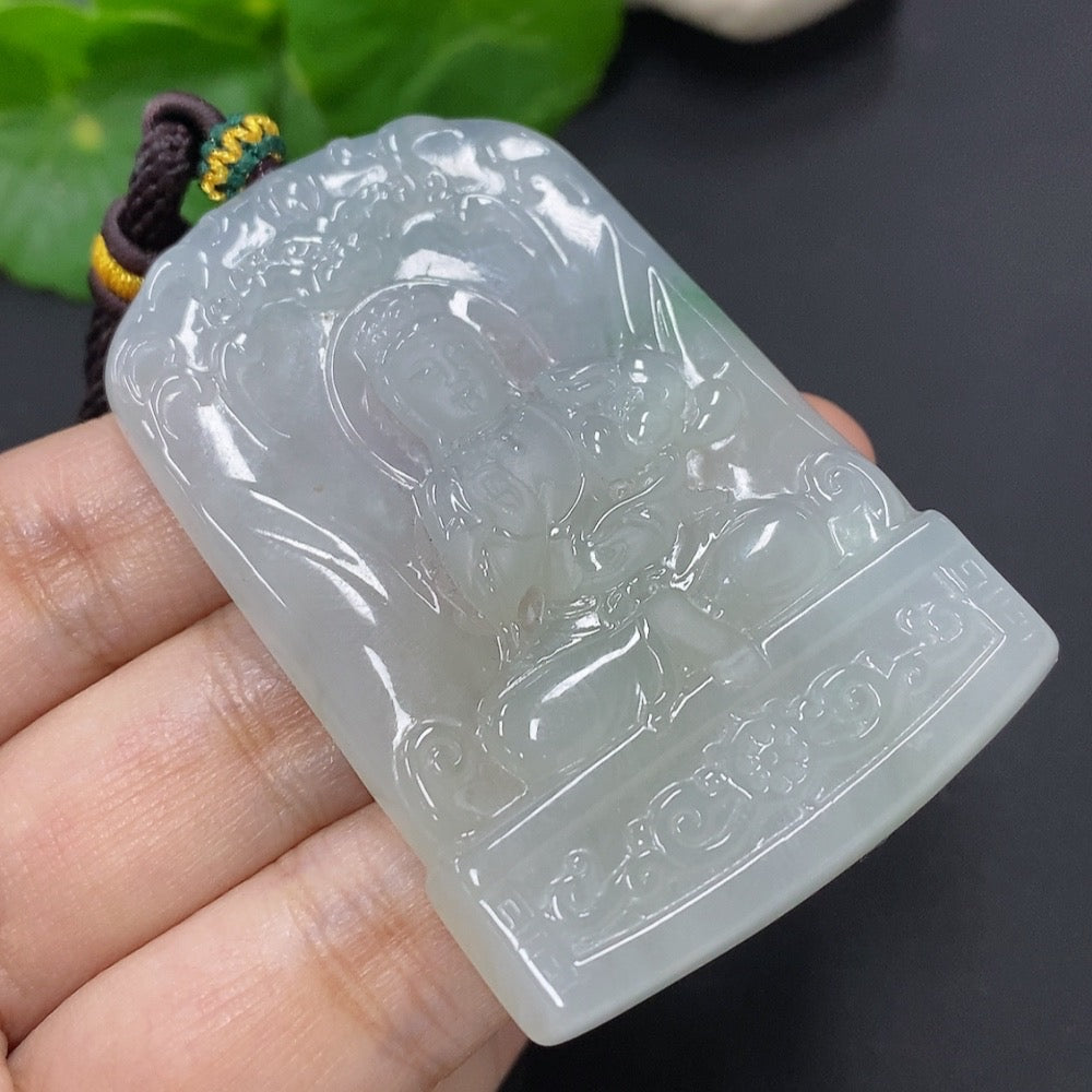 Huiliu Jadeite Guanyin pendant with rope, intricately carved jade religious figure, certified by Huiliu, detailed and polished.