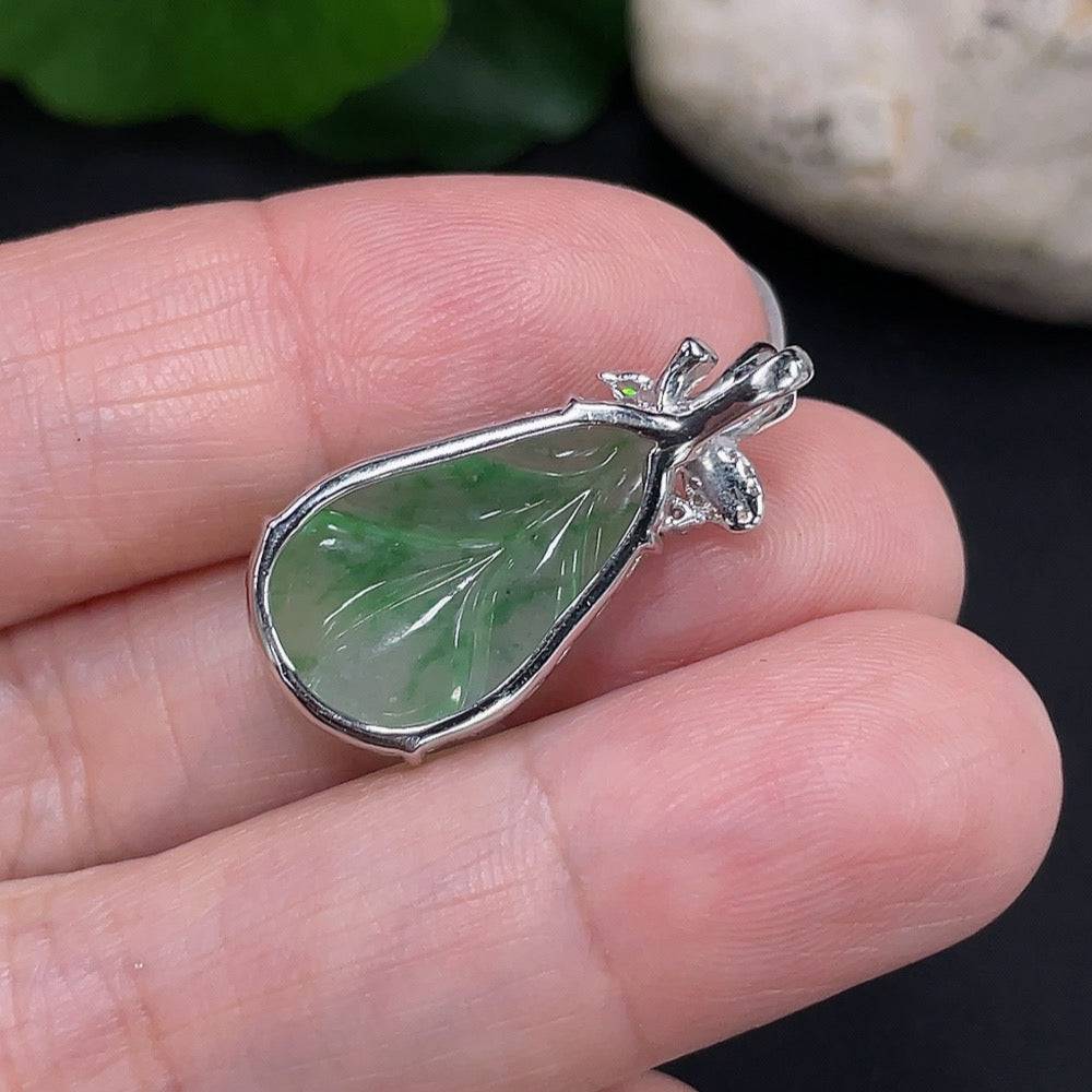 Large HUILIU HQ jade piece, non-diamond, featuring smooth green jade with natural stone textures and polished finish.