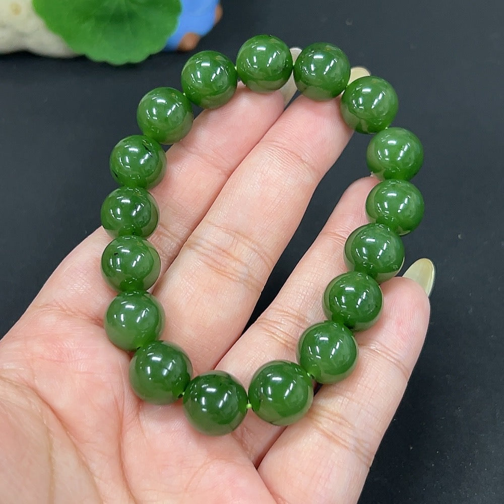 Hetian Jade Jasper bracelet with 11.8mm beads, weighing approximately 46.6g, featuring polished natural jade stones.