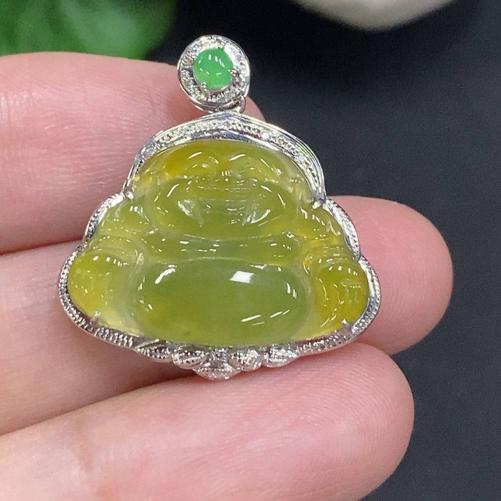 Jadeite Buddha pendant in 18K gold with diamond accents, showcasing intricate craftsmanship and a serene Buddha figure.