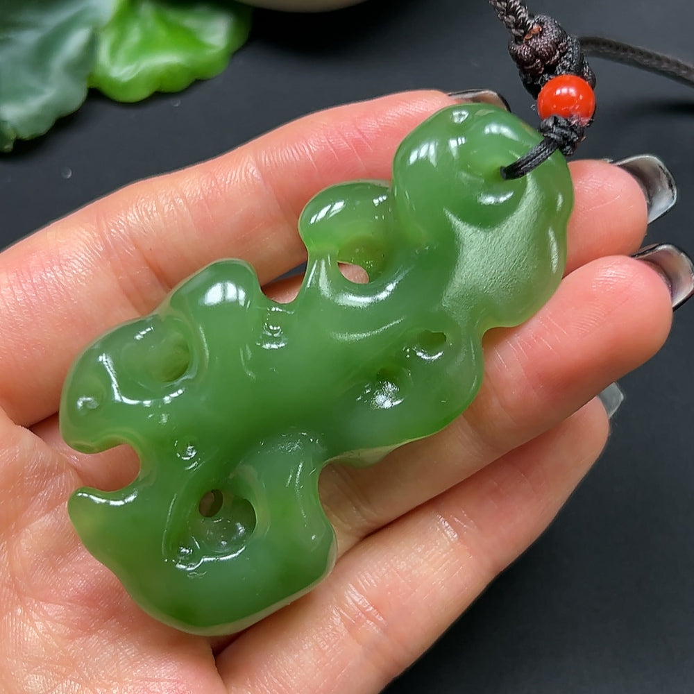 HKHQ Hetian Jade and Coral Stone Pendant necklace with rope, weighs approximately 48.17g, showcasing intricate natural stone details.