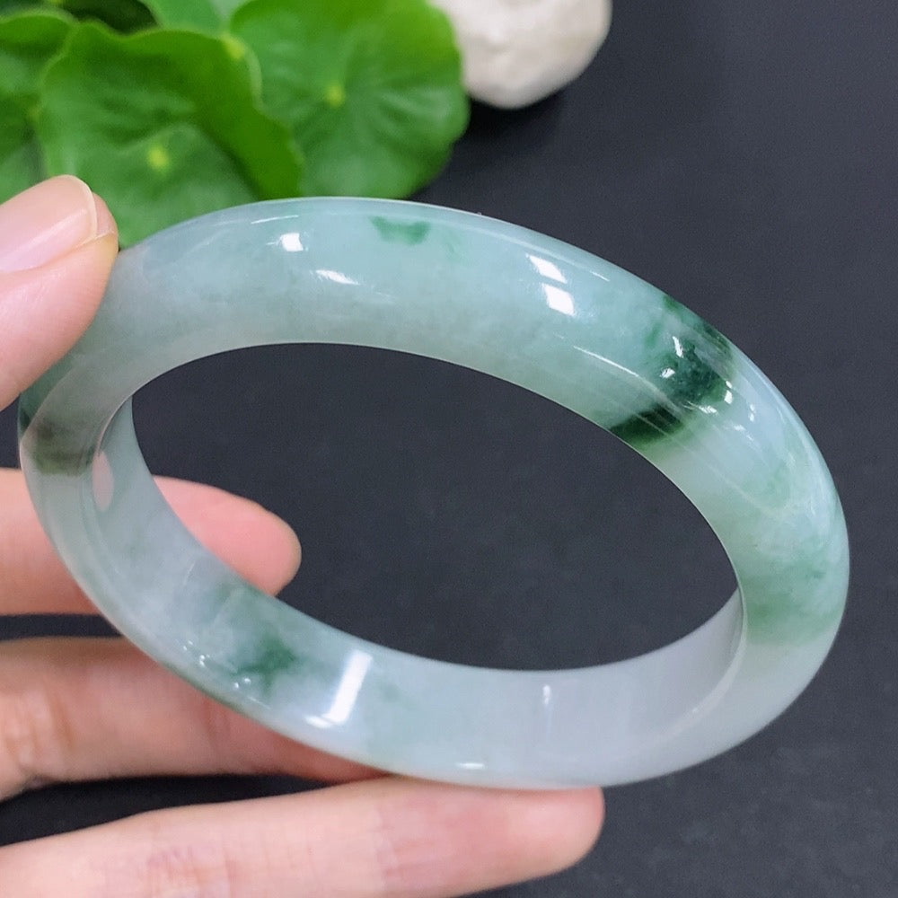 Jadeite round bangle by HKHQ, 65.6g weight, size 60, featuring smooth, polished jadeite with a glossy finish.