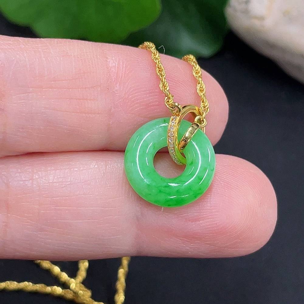 Jadeite inlaid necklace with 18K gold from HUILIU HQ, featuring a delicate jade pendant and gold chain, weighs approximately 2.3g.