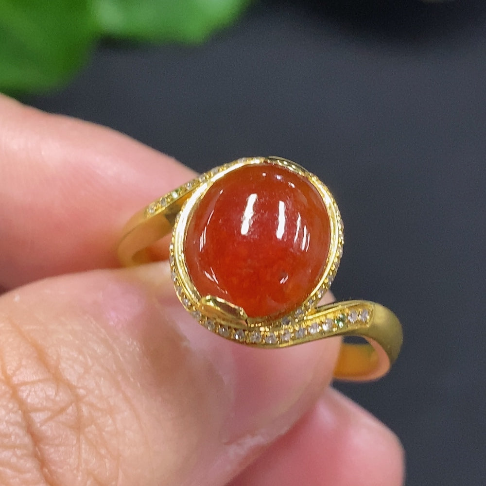 Huiliu Jadeite cabochon ring with colorless diamond accents, showcasing a polished jade stone set in an elegant silver band.