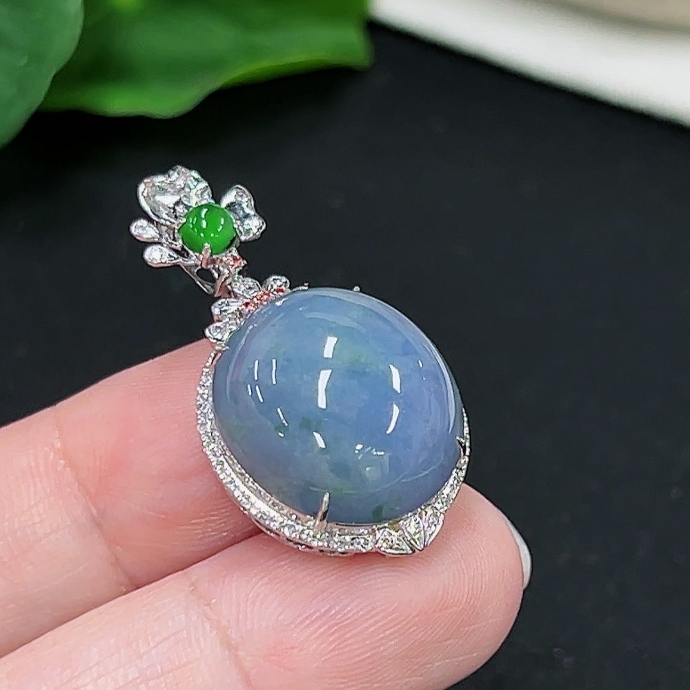 Jadeite cabochon pendant with 18k gold setting and four non-diamond accents, crafted by HKHQ, weighing approximately 5.45g.