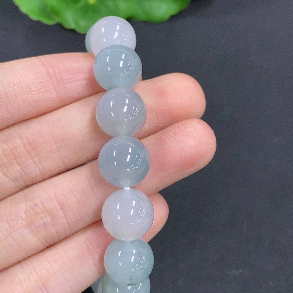 HUILIU HQ jadeite bracelet with 44.7g weight and 11.7mm size, featuring smooth, polished green jade beads on a string.