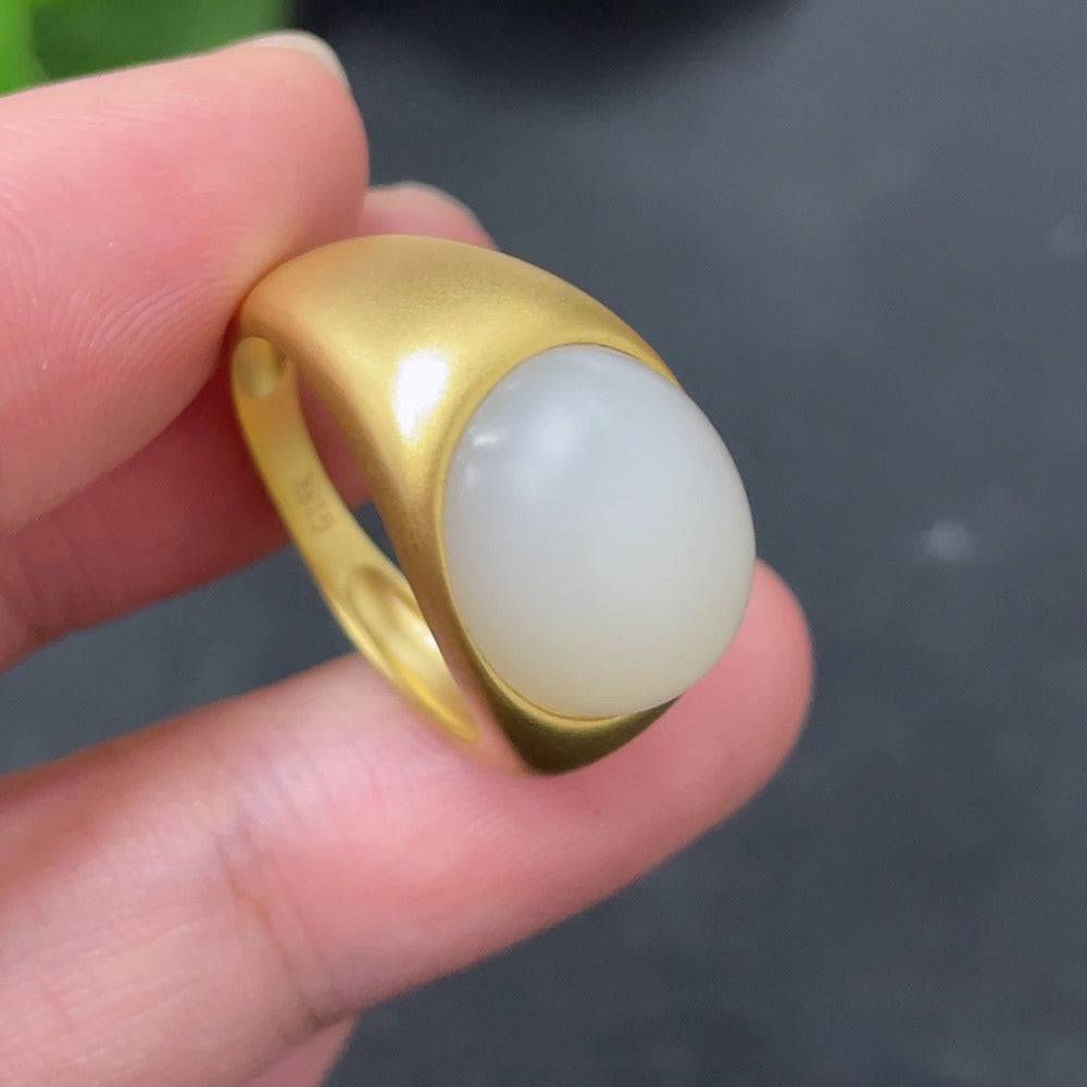 Huiliu HQ Hetian Jade Inlaid Ring featuring a polished jade stone set in a detailed metal band.