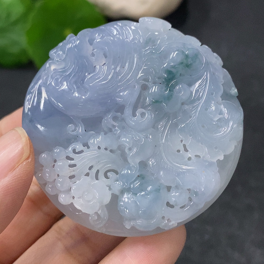 Jadeite Phoenix pendant from HUILIU HQ, showcasing a detailed carved phoenix design on smooth jade, weighing approximately 49.9g.