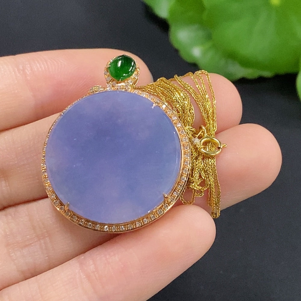 Jadeite plain pendant with 18K gold accents and diamond details, attached to chain, weighing approximately 7.38 grams.