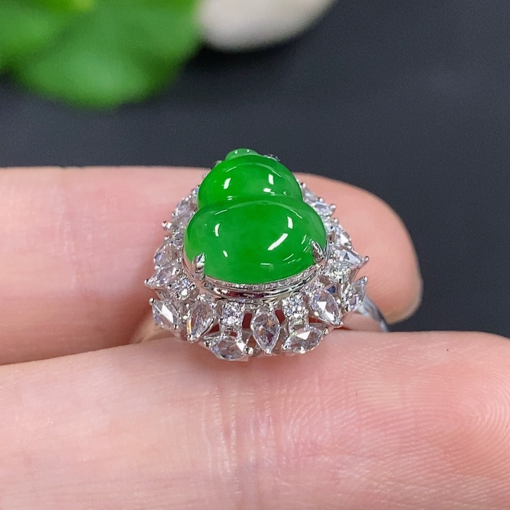 Jadeite gourd inlay ring with 18K gold and diamond accents, elegant jewelry piece by HKHQ featuring intricate design.