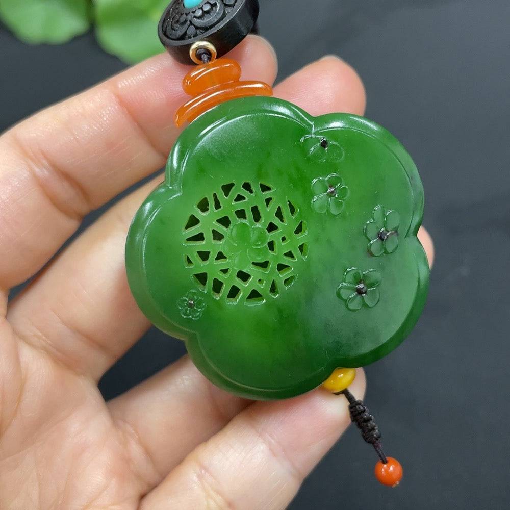 Hetian jade jasper pendant featuring blooming flowers and symbols of wealth, crafted by HUILIU HQ.