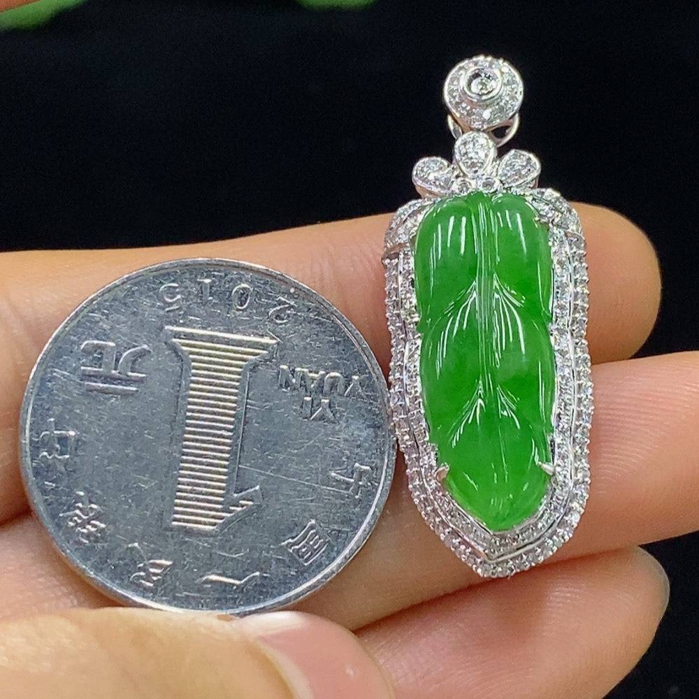 Jadeite leaf pendant with 18k gold and diamond accents, showcasing intricate design and natural green jade, by HUILIU HQ.