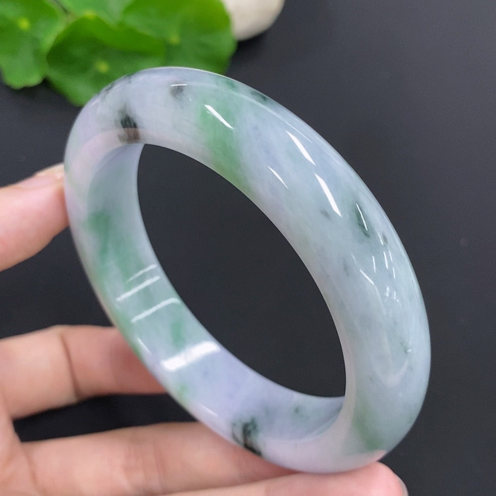 HKHQ jadeite round bracelet weighing 83.4g with mineral inclusions, featuring a 59.4mm diameter and smooth polished surface.