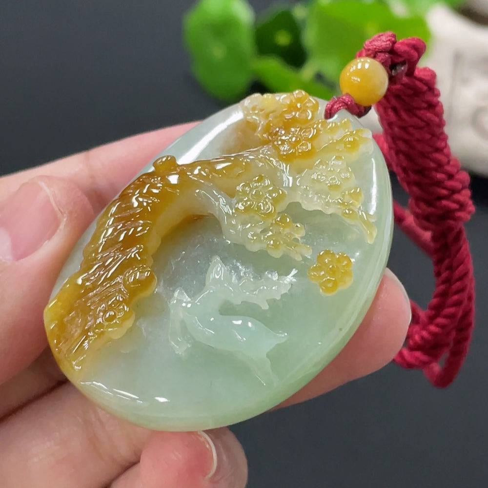 Huiliu Jadeite Deer Pendant with intricate carved details, showcasing a smooth, polished green jade surface and elegant design.