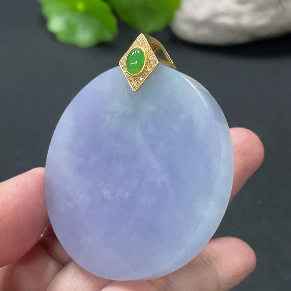Jadeite plain pendant with 18K gold clasp and diamond accents, showcasing a smooth jade surface and elegant design.