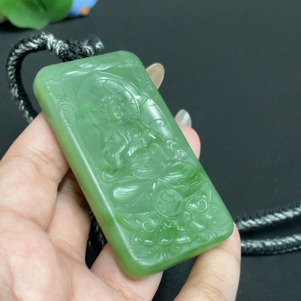 Huiliu certified Hetian jade pendant featuring Guanyin figure with rope, showcasing detailed craftsmanship and smooth jade surface.