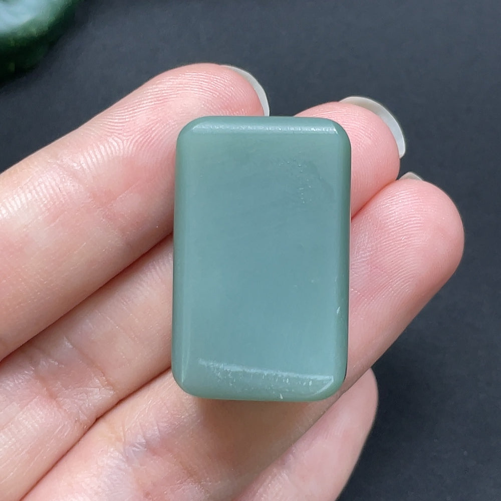 Heitian jade plain pendant necklace from HKHQ, showcasing a smooth, polished jade pendant in a natural setting.