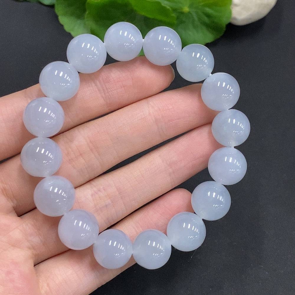 Jadeite bracelet from HUILIU HQ showing a 12mm jade bracelet with a total weight of 50.3g, featuring smooth, polished jade beads.