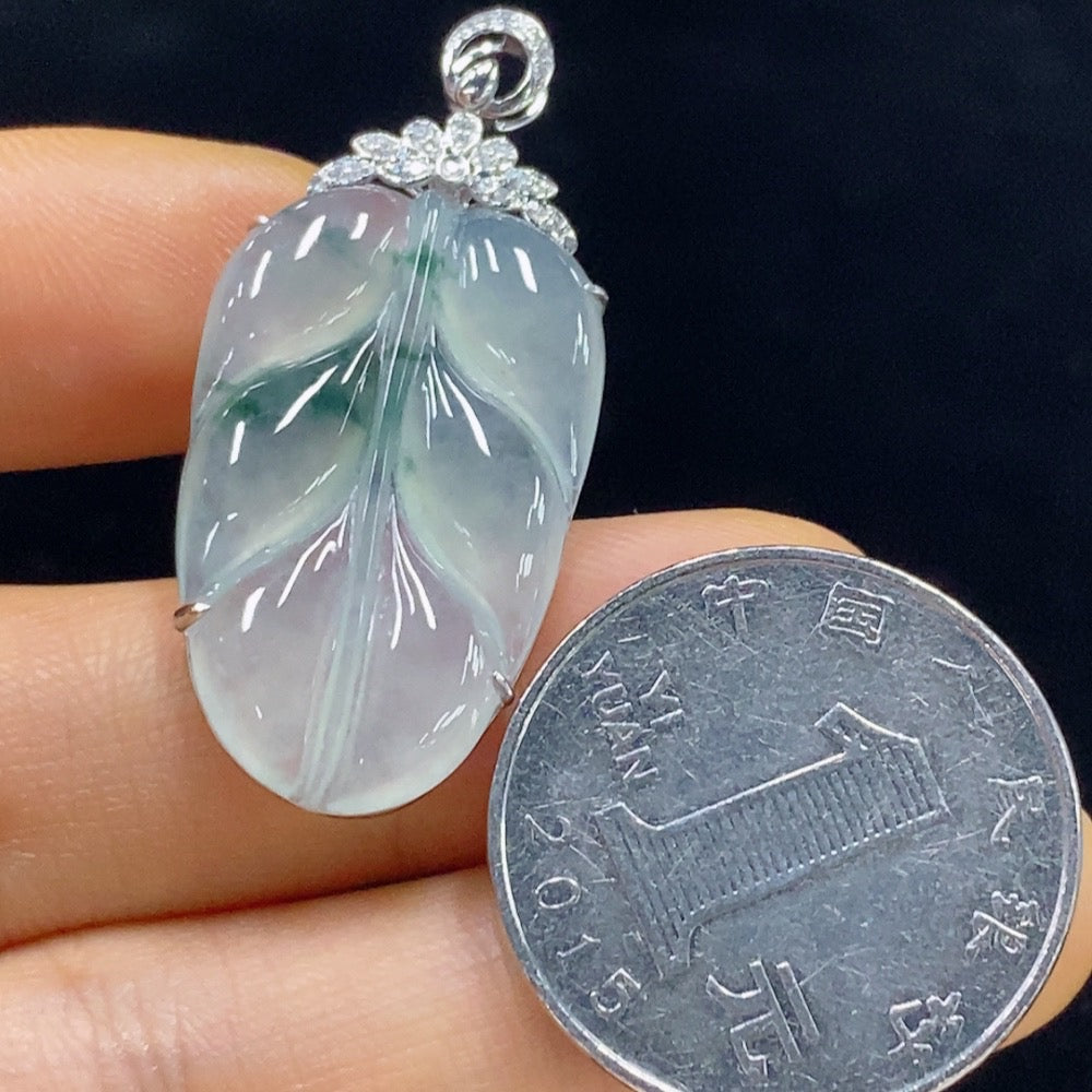 Jadeite leaf pendant with 18k gold and diamond accents, crafted by HUILIU HQ, featuring detailed jade leaf design.