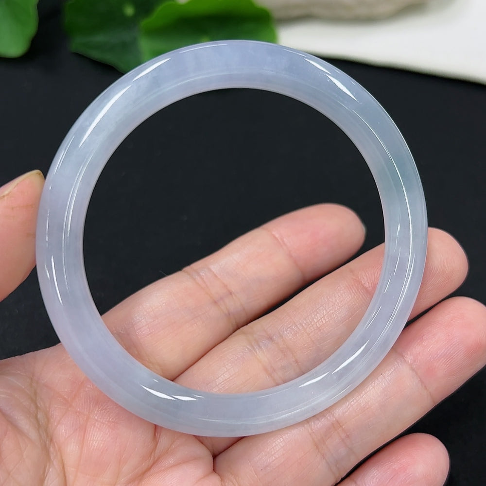 HKHQ jadeite round bangle size 54.7 with a total weight of 27.7g, showcasing smooth, polished jade surface and elegant circular design.