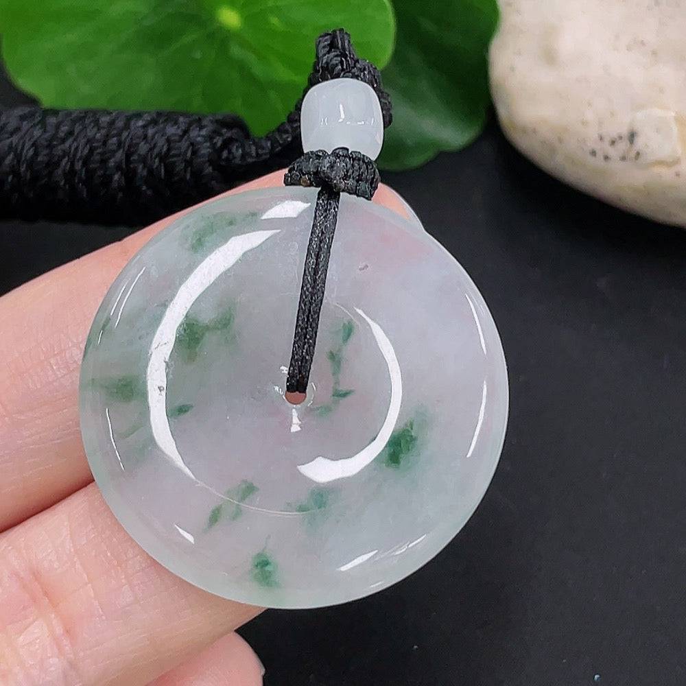 Jadeite Peace Knot pendant with rope, crafted from jade, weighing approximately 13.4g, featuring a smooth, polished surface.