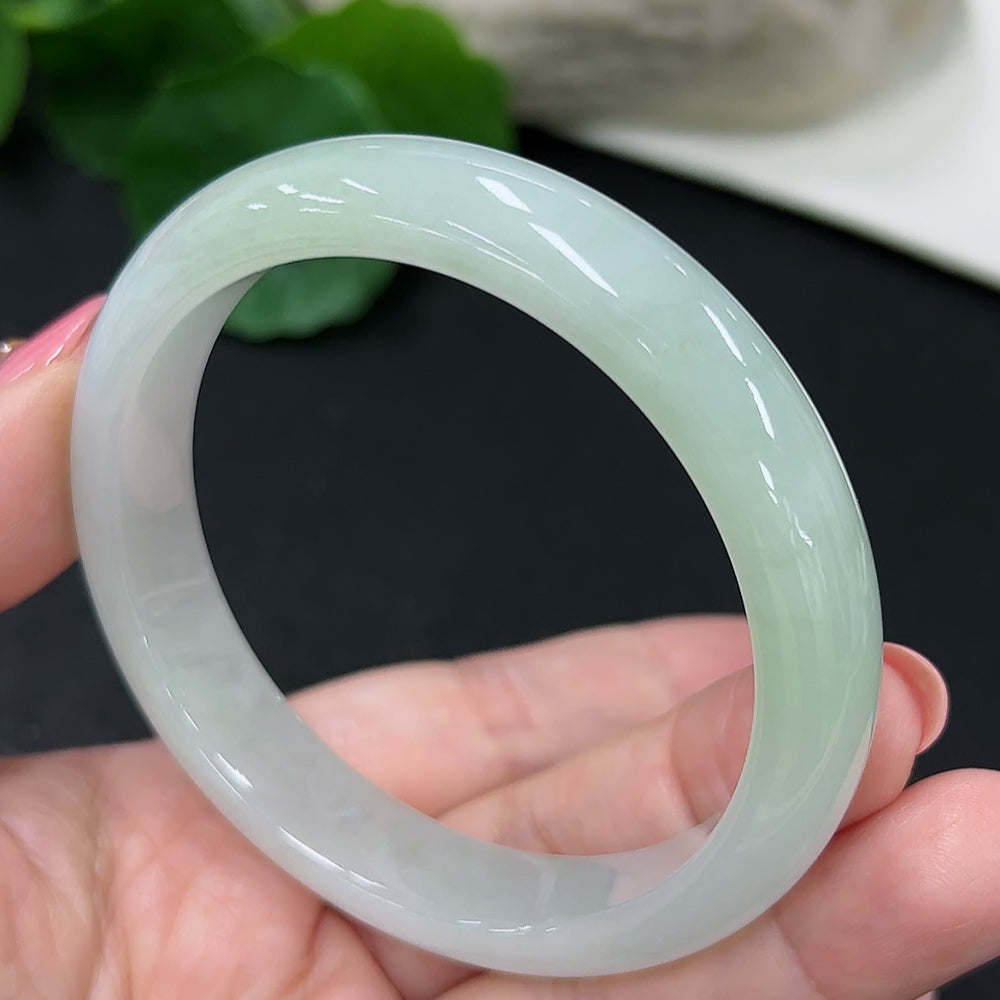 HKHQ jadeite round bangle in size 56, weighing 46.3g, showcasing smooth, polished jadeite with a glossy finish.