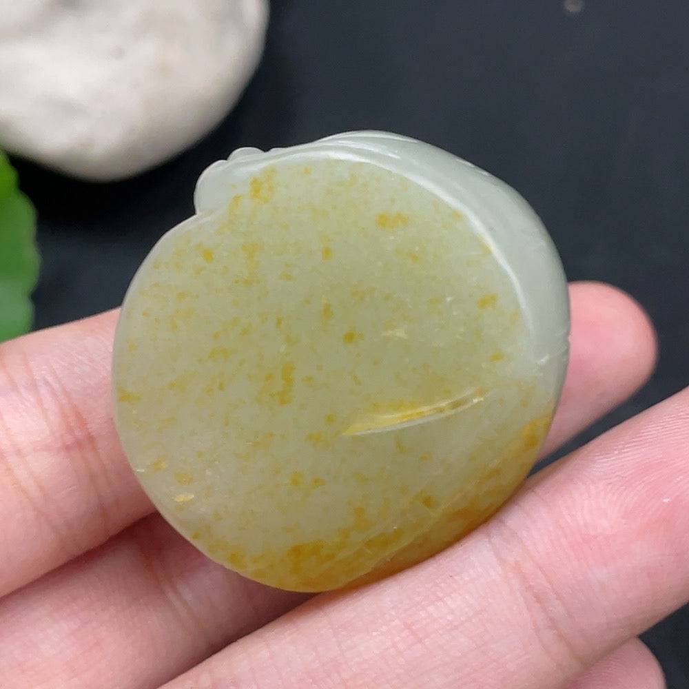 Huiliu certified Hetian jade pendant featuring an auspicious beast design with undetermined skin color formation, elegant and detailed.